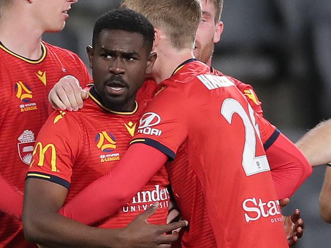 SYDNEY, AUSTRALIA - JULY 30: Pacifique Niyongabire of United  celebrates after scoring a goal during the round 28 A-League match between Adelaide United and the Perth Glory at Bankwest Stadium on July 30, 2020 in Sydney, Australia. (Photo by Matt King/Getty Images)