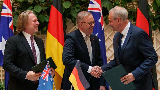 Australian Ambassador to Germany Philip Green, Prime Minister Anthony Albanese and Germany’s State Secretary, Federal Ministry of Defence Benedikt Zimmer after the signing of the deal. Picture: Twitter.