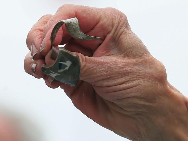 A piece of metal shrapnel from a defective Takata airbag displayed at a press conference in Washington, DC in Junme 2015. Picture: Chip Somodevilla/Getty Images/AFP