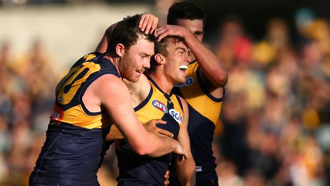 Luke Partington (middle) has signed with Glenelg. Picture: Paul Kane/Getty Images