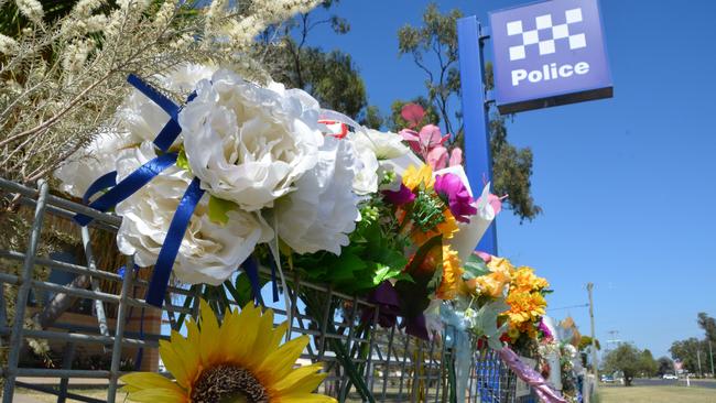 Flowers, wreaths and tributes to Constable Rachel McCrow and Constable Matthew Arnold at Tara Police Station.