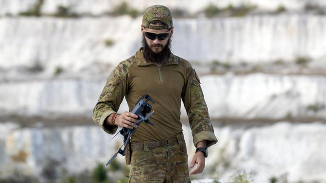 Ethan McNamara with a drone near his base in Ukraine’s east. Picture: Liam Mendes