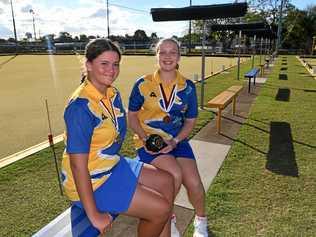 SUCCESS: Hannah Ogden and Breeanna Pegg with their medals from the recent state titles. Fellow Bundy juniors Nick Cahill and Jack Davies also won medals. Picture: Mike Knott BUN160419BOWLS1