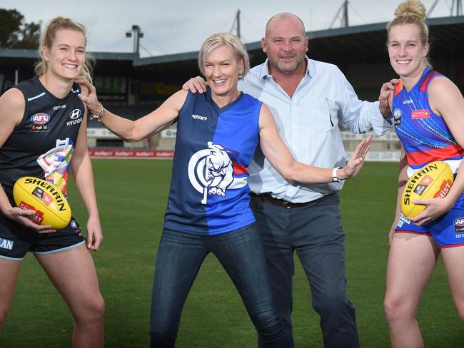 Moody, his wife Sarah and their twin daughters Breann and Celine, who play AFLW.