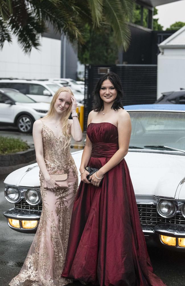 Tia Wallis (left) and Anna Rosinski arrive at Toowoomba Flexi School formal at Burke and Wills Hotel, Thursday, October 10, 2024. Picture: Kevin Farmer