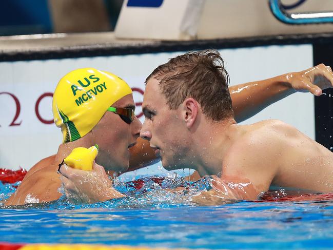 Australia's Cameron McEvoy congratulets Kyle Chalmers winning the Gold medal in the Men's 100m Freestyle Final on day five of the swimming at the Rio 2016 Olympic Games. McEvoy finisehd 7th. Picture. Phil Hillyard