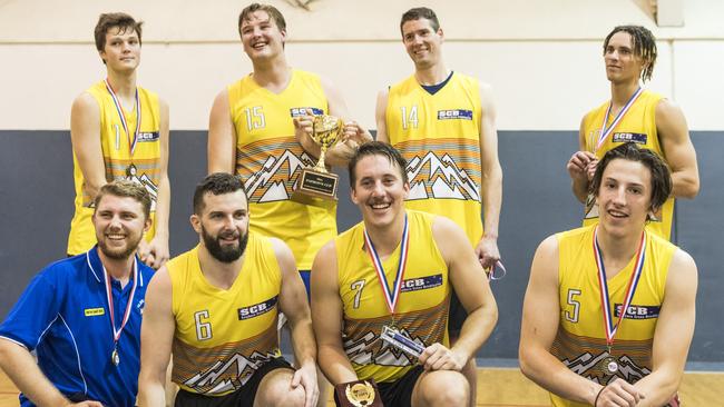 Southern Cross Bricklaying Eels celebrate winning the Toowoomba Basketball League grand final against Westridge Fruit and Veg Warriors. Picture: Kevin Farmer