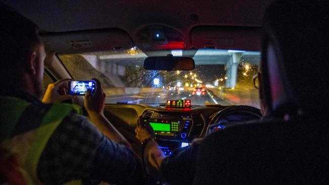 The ambulance speeds down the M1 en route to the Mudgeeraba Holiday Village. Picture: Jerad Williams