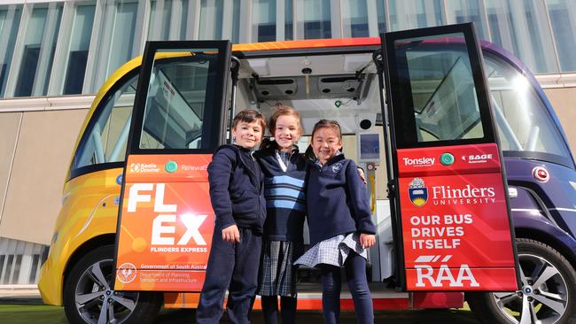 Tea Tree Gully Council is considering a driverless bus to ease congestion around the Modbury precinct, like the one introduced at the Tonsley Innovation District and used by Xavier, Elsa and Livia. Picture: AAP/Tait Schmall.