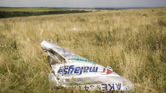 IMAGES OF THE YEAR 2014 - NEWS - 298 Crew And Passengers Perish On Flight MH17 After Suspected Missile Attack In Ukraine