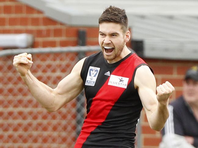 VFL: Essendon v North Ballarat at Windy Hill, Essendon. Essendon No 64 Murphy Ambrose celebrates a goal.