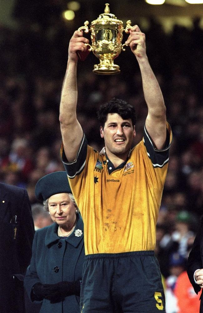 John Eales the captain of Australia raises the Webb Ellis trophy after winning the Final of the 1999 Rugby World Cup. Picture: Nick Wilson / Allsport