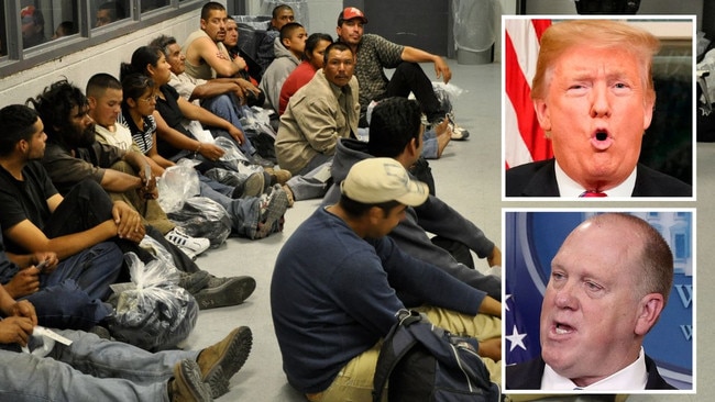 Suspected illegal immigrants lined up along the wall in the processing facility. Picture: NGTV