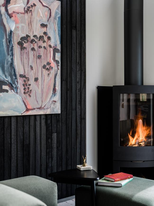 The cosy freestanding wood heater at Kittawa Lodge on King Island. Picture: Adam Gibson