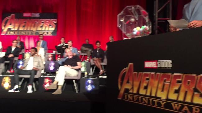 RAW: Hemsworth and Avengers co-stars squeeze on stage for junket