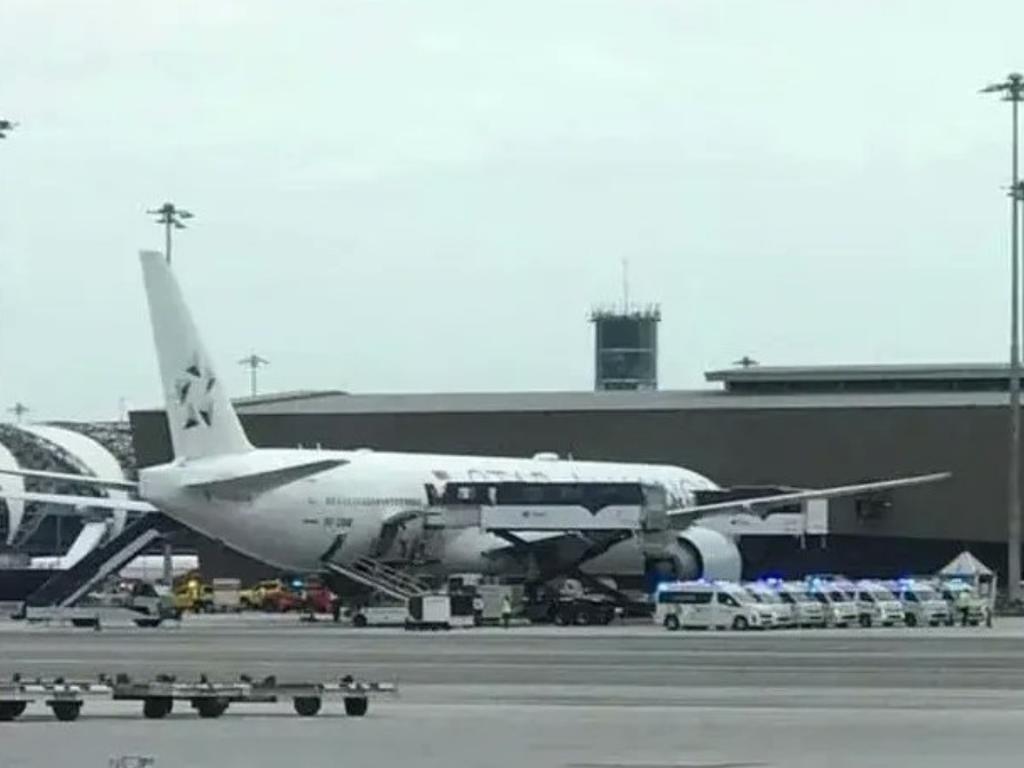 Emergency service vehicles are seen waiting for the plane – 30 people were injured and one older gentleman from the UK died of a suspected heart attack. Picture: Twitter