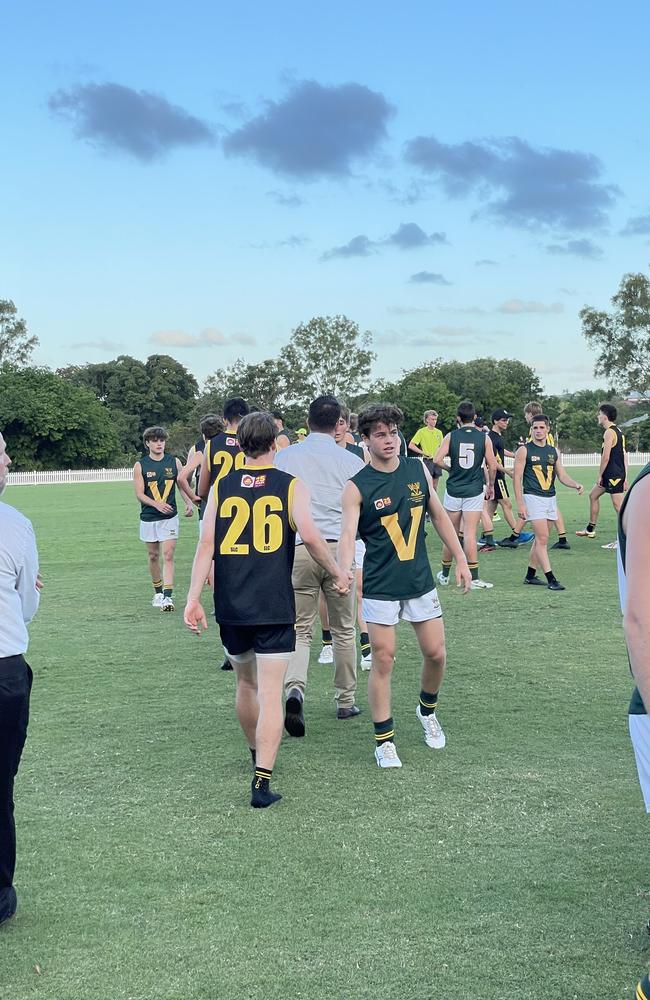 Handshakes after a great game from both sides.