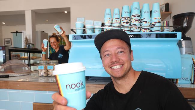 After a year of uncertainty, Nook Espresso co-owner Marcus Wilkins settles into the coffee shop’s new home in the Old Burleigh Theatre Arcade. Picture Glenn Hampson