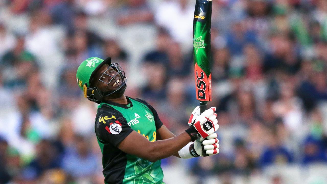 Dwayne Bravo using his bat wrap on Sunday night. Photo: AAP Image/George Salpigtidis.