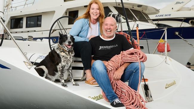 Brigid Dighton and Johnny Hilhorst with their dog, Seb, 10, on Brindabella at Outer Harbor. Picture: Matt Loxton