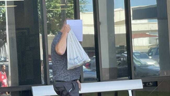 Ian Duncan leaves Cairns Magistrates Court after the first mention of his matters on Thursday.