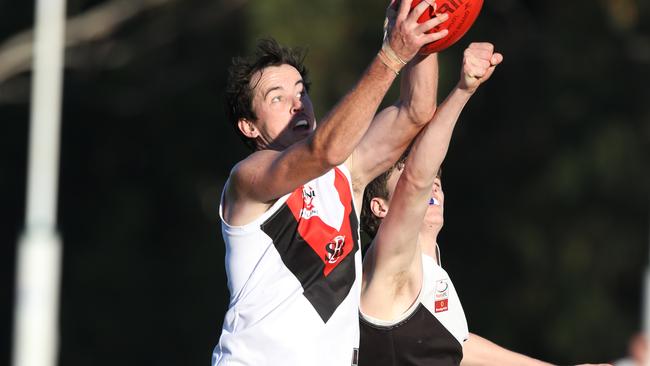 EFL Division 2 2022: Ringwood ( in black )v South Belgrave at Jubilee Park.South Belgrave 23 Mitchell Garner in action.Picture: Stuart Milligan