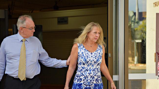 Jennifer Westra van Holthe (blue dress) leaving Darwin Local Court after being charged with aggravated assault.