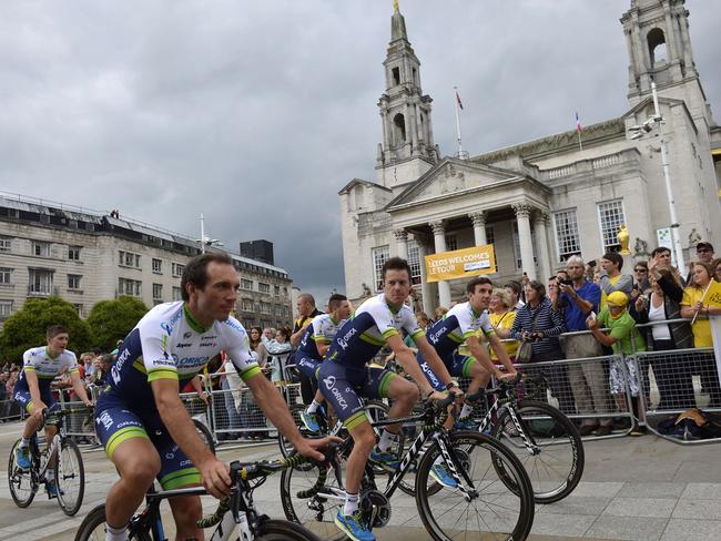 Orica-GreenEDGE riders cycle throughout the streets of Leeds before the start of the Tour de France.