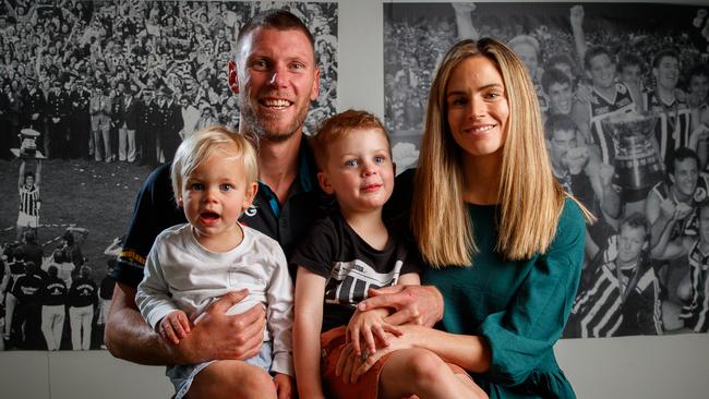 Ebert with his wife Bec and sons Leo, 3, and Henry, 1 after announcing his retirement. Picture: Matt Turner.