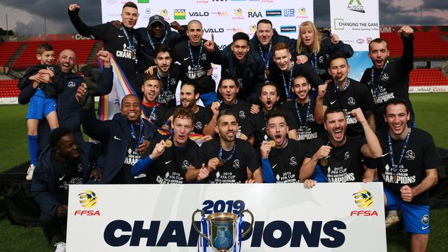 Adelaide Olympic players and staff following their FFA Cup SA final triumph at Hindmarsh Stadium. Picture: AAP/Emma Brasier