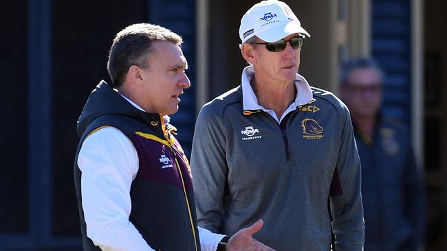 Broncos boss Paul White talks to coach Wayne Bennett. Picture: AAP