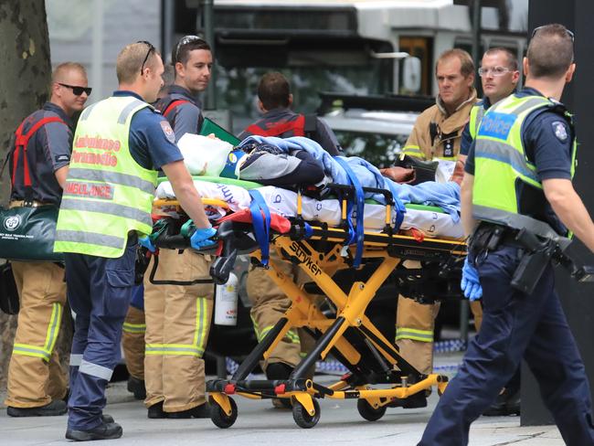 Paramedics at Bourke Street and Elizabeth Street. Picture: Alex Coppel