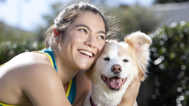 Gymnast Georgia Godwin has kept up her gymnastics training at her Manly West home with the help of her dog Rosie. 11.07.2020 Picture: Renae Droop