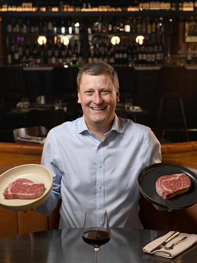 File picture of AACo CEO Hugh Killen with premium raw steaks on a plate at Angus and Bon in Prahan. Picture: Naomi Jellicoe