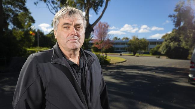 Clarence High School association chair Glenn Maddock outside the school, which he says is in desperate need of major upgrades. Picture: Richard Jupe