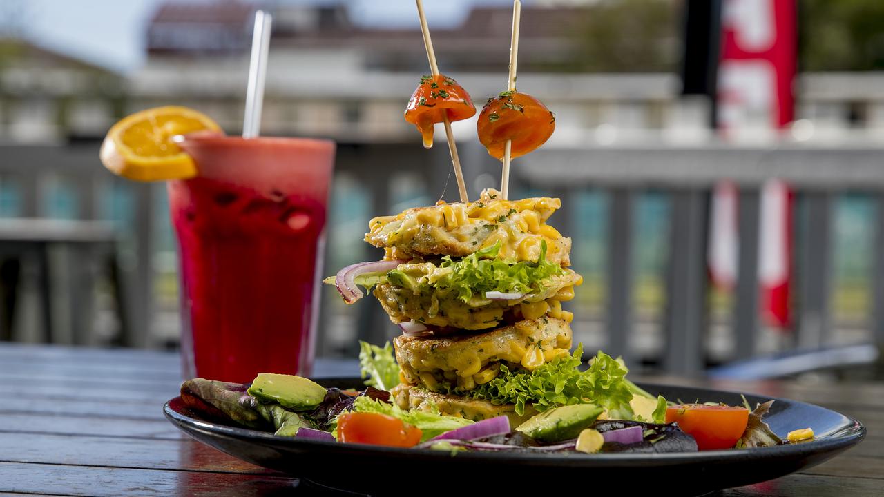 Frigg Cafe specialises in simple food one well, such as their corn fritter stack. Picture: Jerad Williams