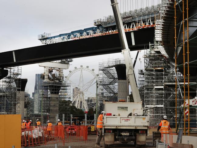 The elevated road is now at 83 per cent complete with the massive launching gantry in place finishing the construction. Picture: David Caird