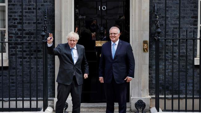 Britain's Prime Minister Boris Johnson greets Australia's Prime Minister Scott Morrison outside 10 Downing St in central London. Picture: Tolga Akmen/AFP