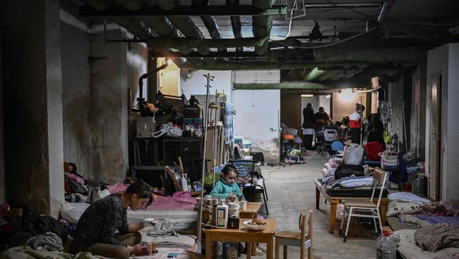 Children being treated at a pediatrics hospital have their beds placed in the basement, which is being used as a bomb shelter, in Kyiv. Picture: AFP