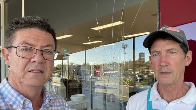 Last media photograph of Southport MP Rob Molhoek before his stroke — he was talking to retailers at Southport Park Shopping Centre after youth vandals struck, smashing windows.