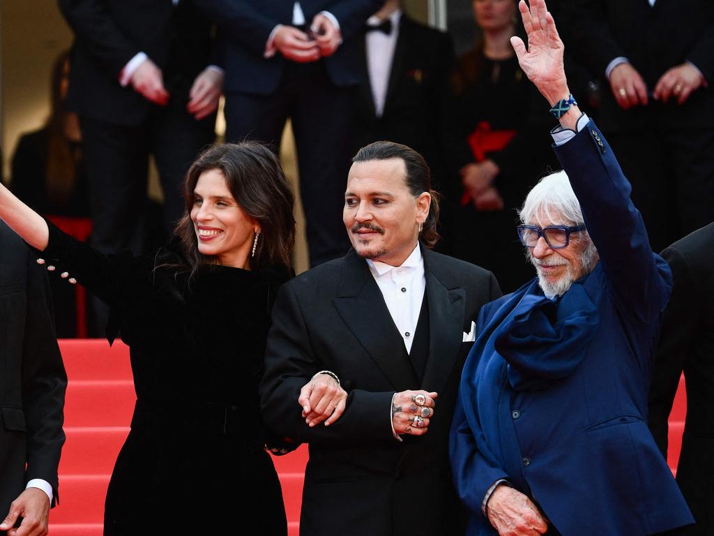 Depp walked the red carpet with director Maiwenn and French actor Pierre Richard at the Cannes Film Festival on May 16. Picture: Christophe Simon/AFP