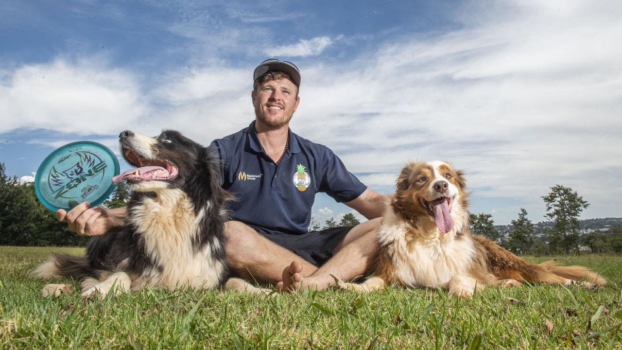 Keron Redman, with his dogs Archer and Stirling, is a member of the Toowoomba Disc Golf Club. The club will have to find a new home after the council rejected a proposal to move to Alex Horn Park. Picture: Nev Madsen.