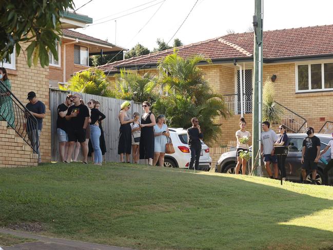 Prospective tenants line up to view a rental open home. Picture: Liam Kidston.