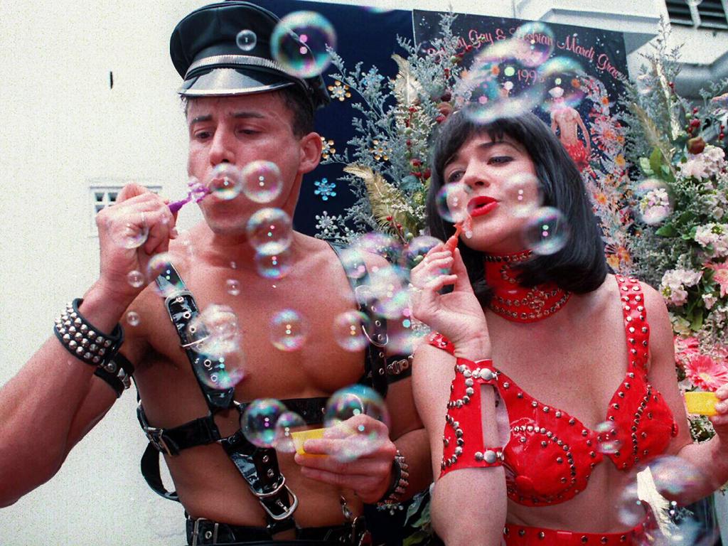 Two Mardi Gras participants kick off the 1995 festival. Picture: Jeremy Piper