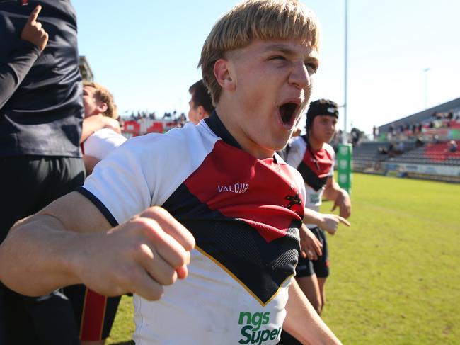 NSW CIS's Reilly Caswell celebrates the teams win after the under 15 ASSRL schoolboy rugby league championship grand final between  NSW CHS v NSW CIS from Moreton Dailey Stadium, Redcliffe. Picture: Zak Simmonds