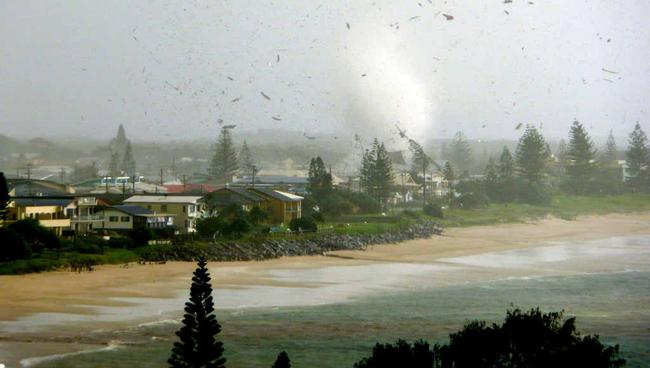 The Lennox Head tornado pictured tearing through the town on June 3, 2010. Picture: Contributed