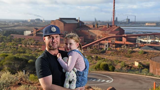 Mine worker Alex Manners with four-year-old daughter Lila on Hummock Hill in Whyalla. Picture: Tom Huntley