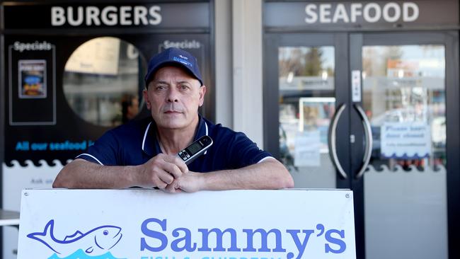 Sammy Klementou, owner of Sammy's Fish and Chippery has lost $20k over three years due to prank phone call orders. He says he get 50 to 60 calls per day. Picture: Kelly Barnes