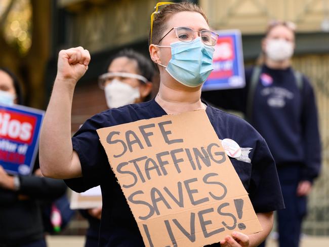 SYDNEY, AUSTRALIA - NewsWire Photos September 1, 2022: People participating in a Solidarity Rally outside St Vincents Hospital in support of Nurses and Midwives who are striking for 24 hours over pay and staffing levels. Picture: NCA NewsWire / James Gourley