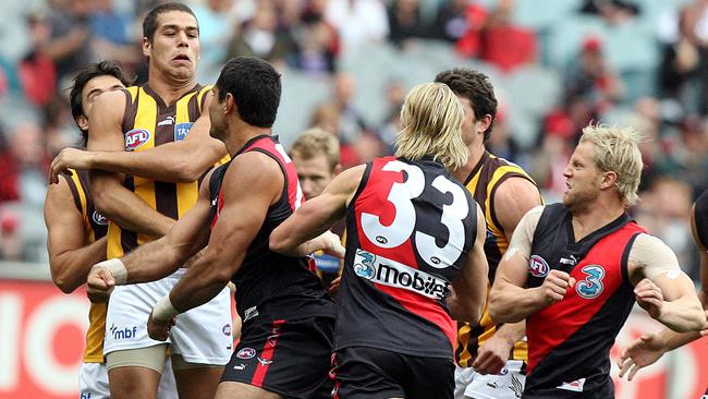 Lance Franklin takes on Essendon’s Mal Michael in 2007. Picture: Wayne Ludbey